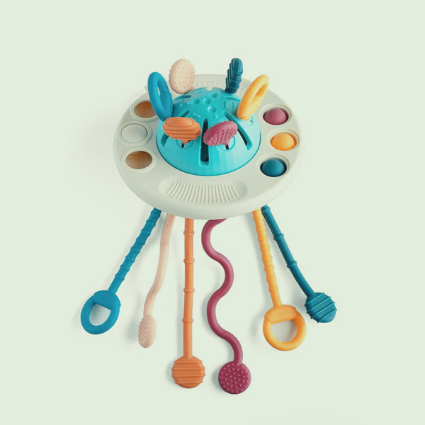 Montessori UFO Sensory Pulling Toy on a light beige background.