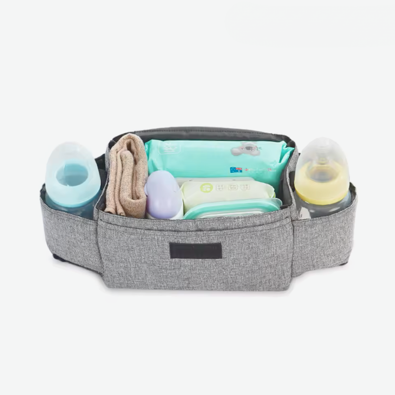 Small Baby Diaper Bag with Hasp Closure opened showing diapers and baby bottles on a white background