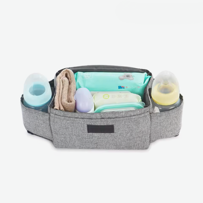Small Baby Diaper Bag with Hasp Closure opened showing diapers and baby bottles on a white background